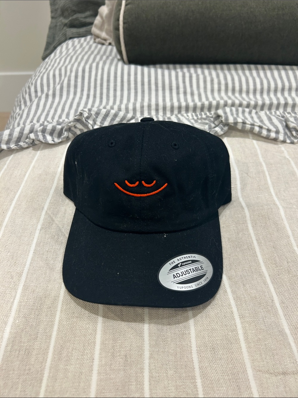 The Classic Black Cap with Headspace Orange Smile Embroidery